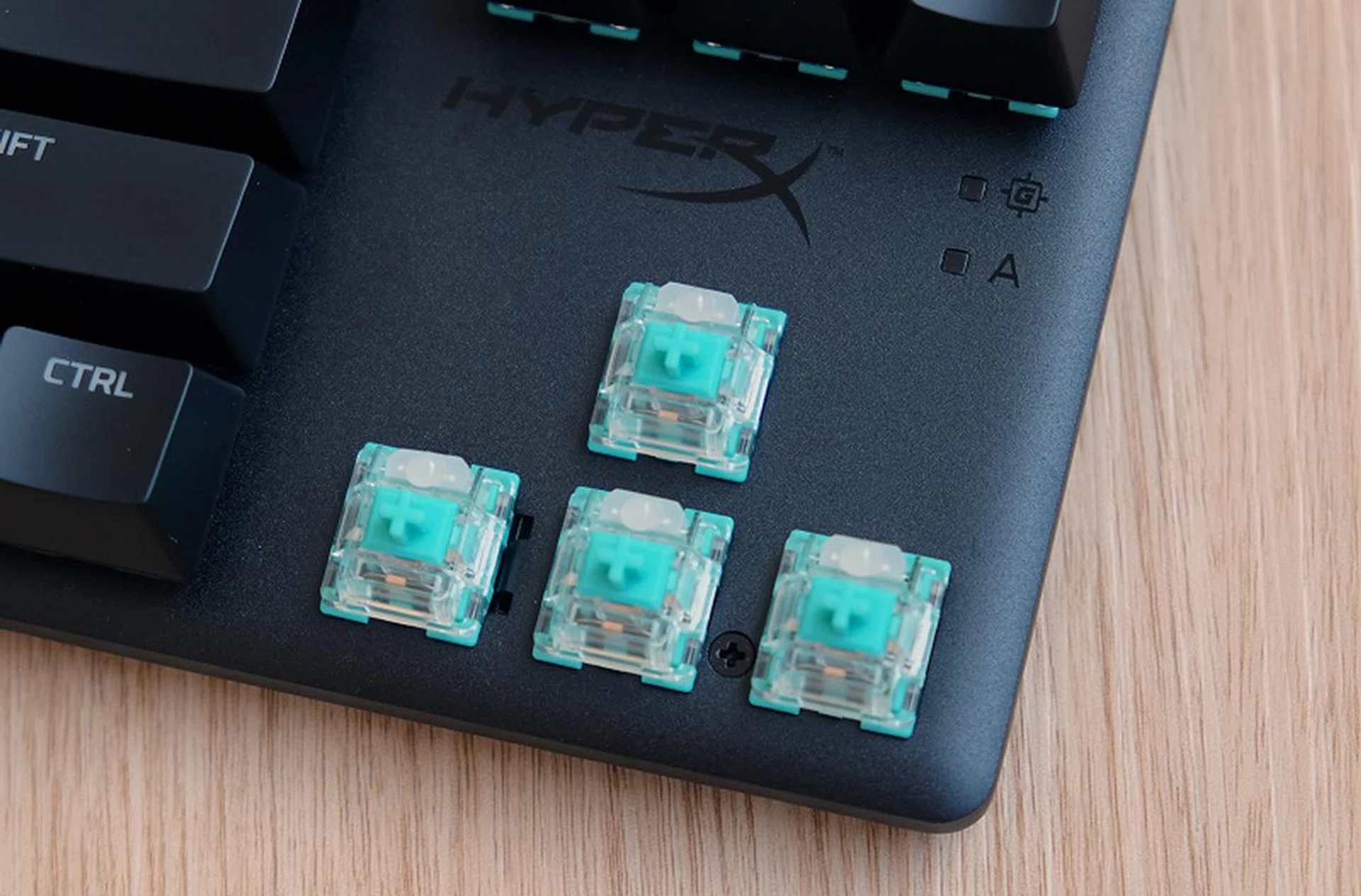 Behold, the HyperX Aqua switch. It's an interesting colour choice for a key switch.