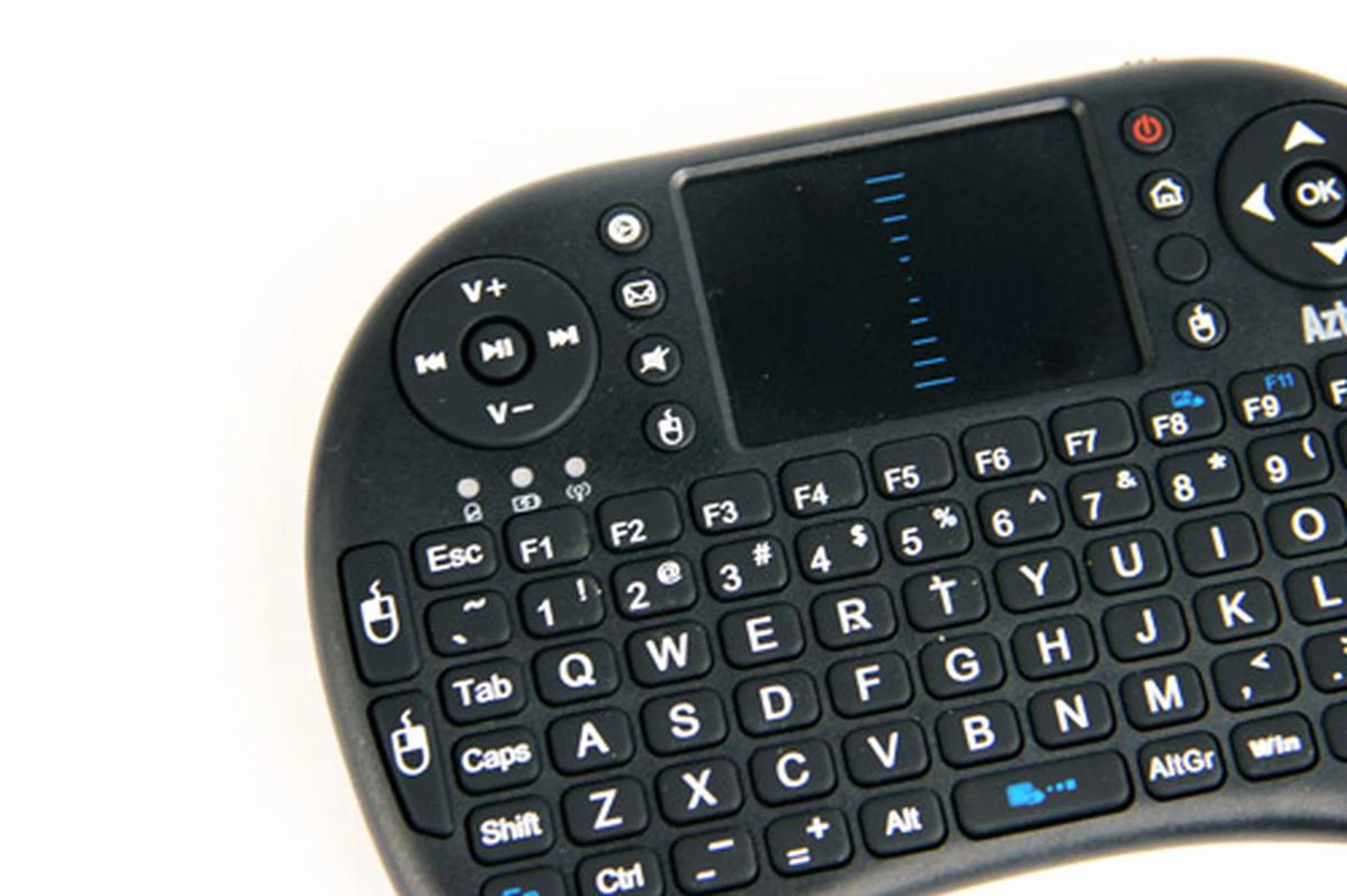 At the bottom left of the touch pad is a button which functions as the left mouse button, or rather, the "select" button.