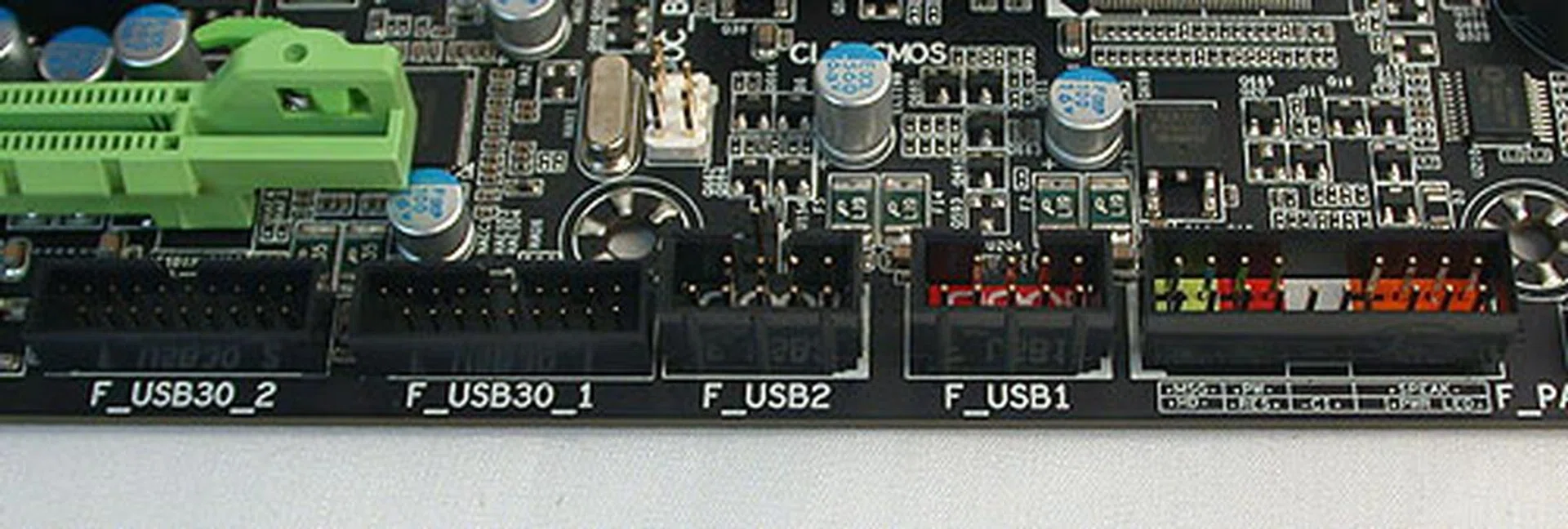 There are no onboard power/reset buttons to our surprise. Perhaps Gigabyte is expecting gamers not to fool around overclocking and tweaking, but to actually hone their gaming skills. Besides the front panel headers, there are four USB headers, with two headers meant for USB 3.0. This is a board that has USB 3.0 covered extensively.