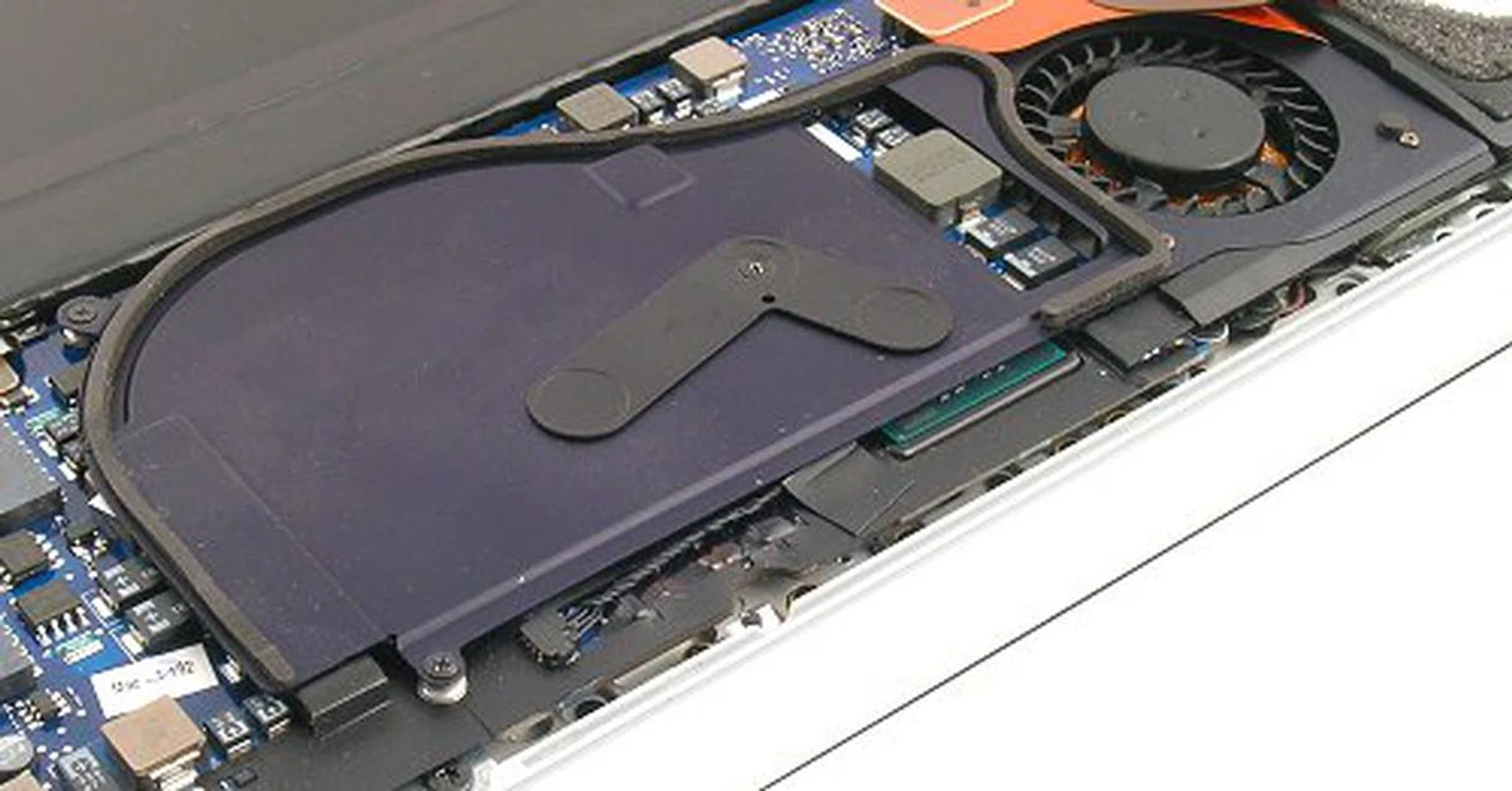 A very thin heat shroud covering the core compononents on the MacBook Air so that the fan can push in airflow.