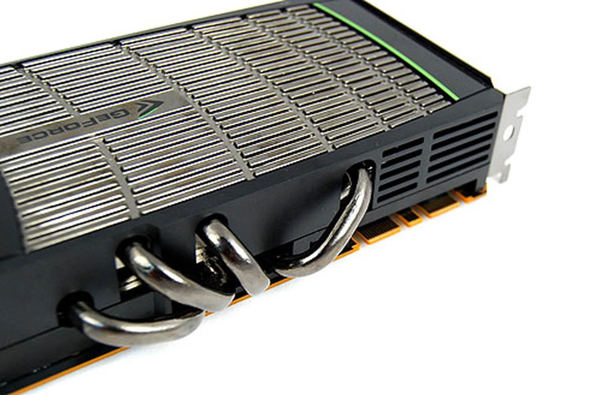The four thick heat pipes are a necessity seeing that the card has a rated TDP of 250W. In comparison, a Radeon HD 5870's rated TDP is only 188W. One can also see the two SLI connectors - the GeForce GTX 480 is 3-way SLI compatible.