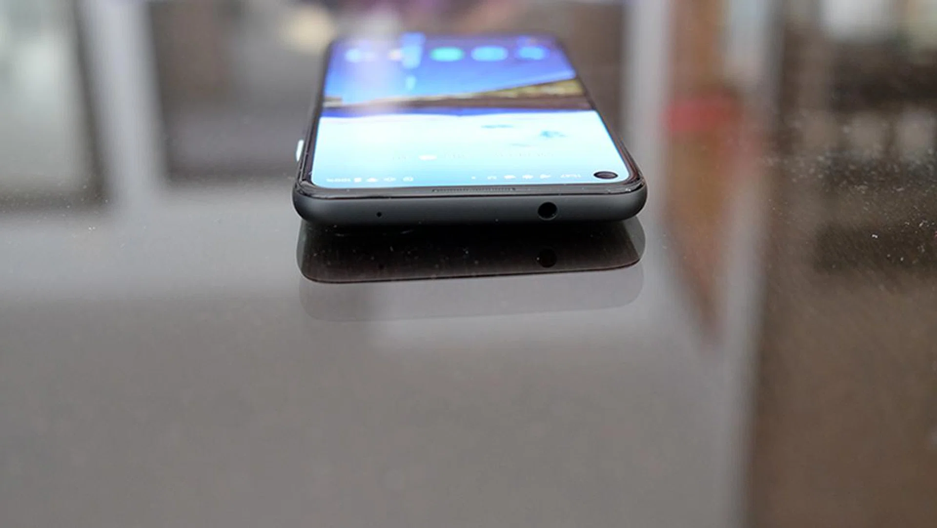 The 3.5mm headphone jack sits at the top of the phone.