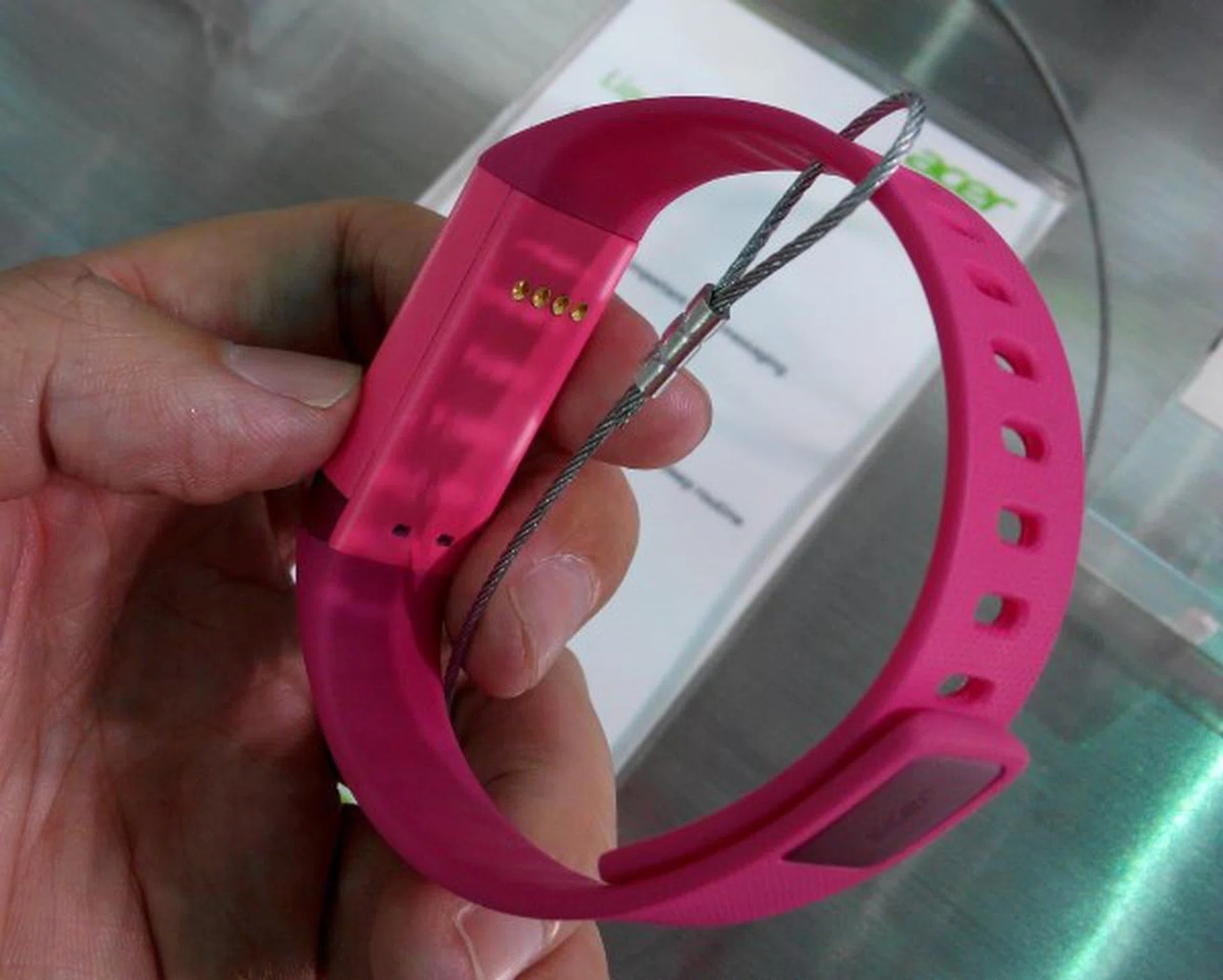 The contacts below are for its charging shell. You cannot directly charge it via USB.