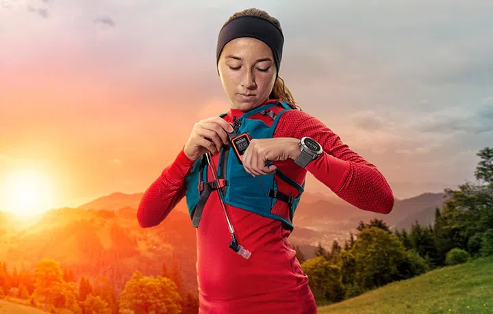 Garmin inReach Mini satellite communicator (orange device).