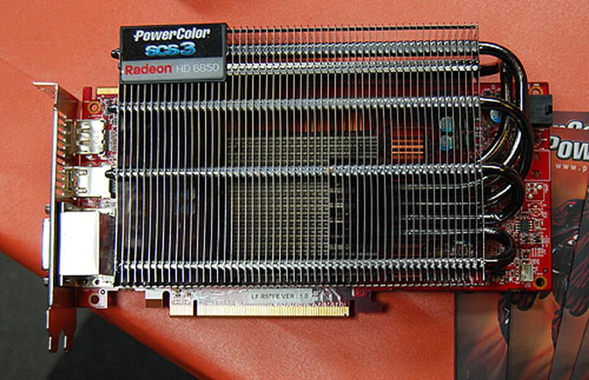 This completely passively cooled Radeon HD 6850 is huge and bulky and weighs more than you expect but it does run quiet. PowerColor told us they designed the square heatsink such that it can be transported with little damage. 