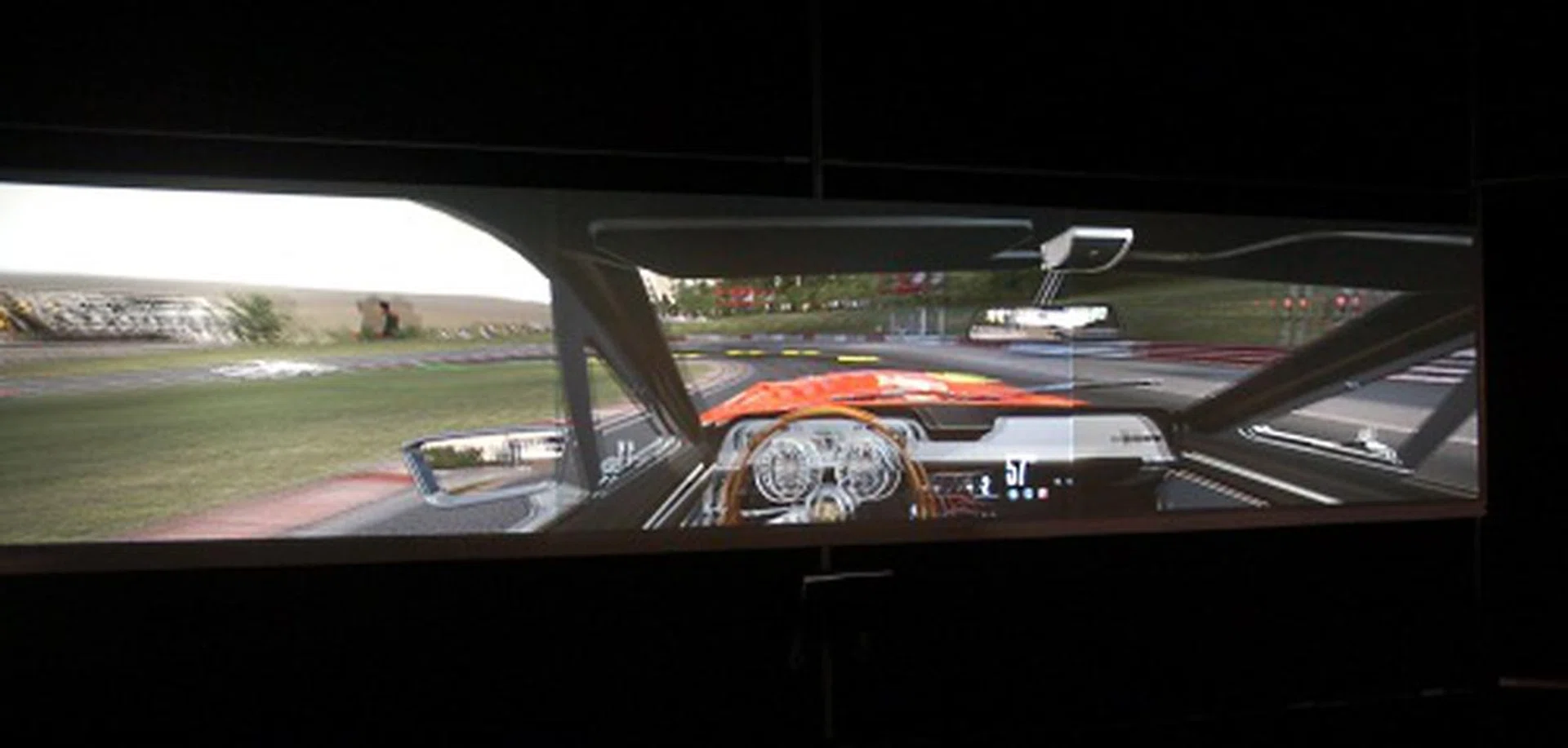 A 3D gaming demo with NVIDIA's 3D Surround Vision. It looks rather impressive and a fan favorite. Powering it inside however is the next-gen GPU, GF100, which presumably is Fermi or a variation of it.