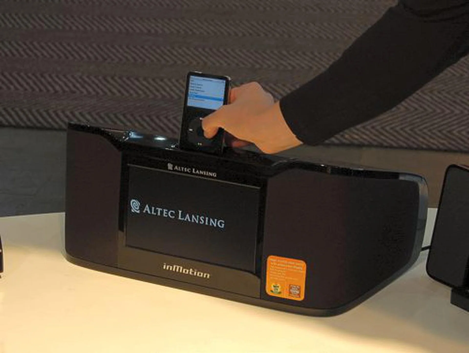  It is compatible with any dockable iPod or even other portable media players with the included adaptor. On its rear, you'll find Composite audio and video inputs, an auxiliary 3.5mm audio jack and an S-Video output connector if you wish to put the video out to your TV. Specs aside, what we do wonder is why this unit falls under the inMotion series as it's not small nor a lightweight unit to stow away easily.  