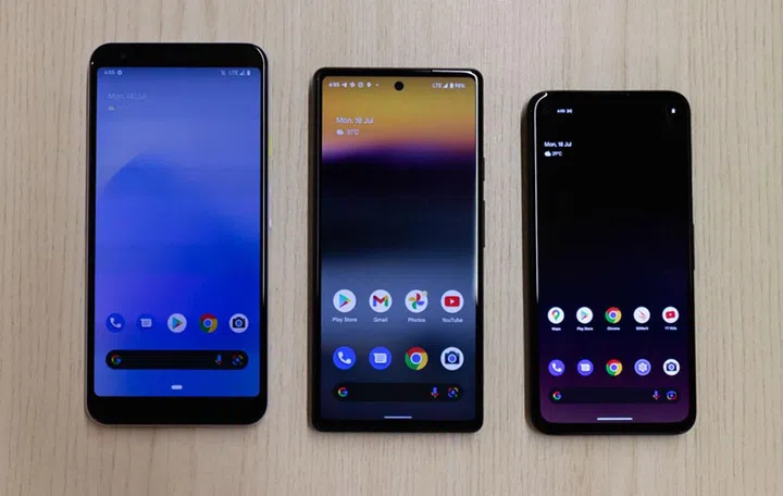 Photo of Pixel 3a XL, Pixel 6a, and Pixel 4a from our Pixel 6a review.