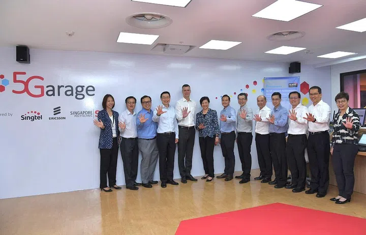 Chief Executive, IMDA, Mr Tan Kiat How and Singtel, Ericsson and Singapore Polytechnic management at the opening of 5G Garage, Singapore’s first live 5G facility.