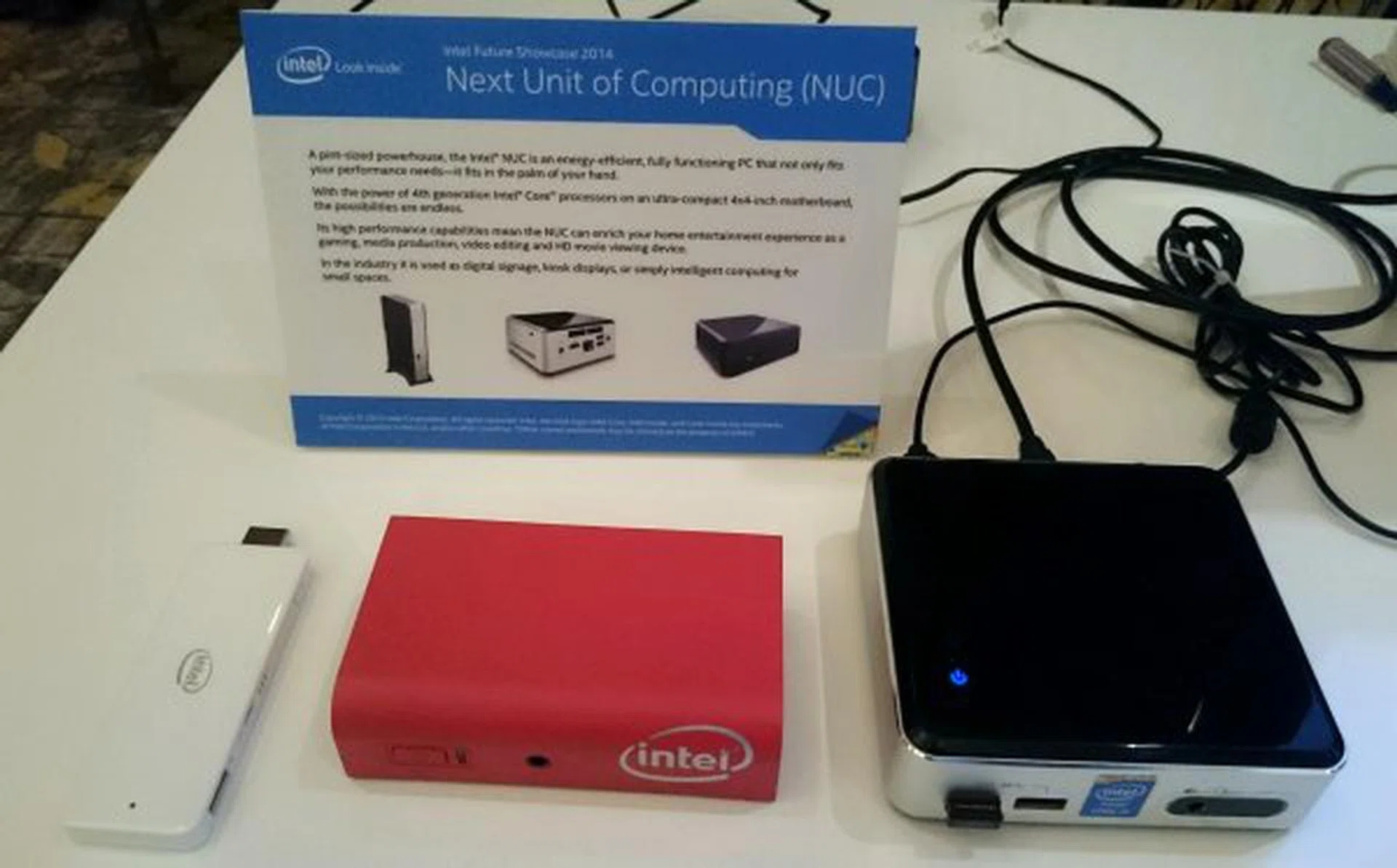 Here's how the new new stick PC compares with existing forms of Intel NUC devices. The hot pink system is one of Intel's internal projects to fulfill specific  OEM needs and it's not a commercial NUC system, but it's brought out here for comparisons as it's the small NUC next to the upcoming PC on a stick system.