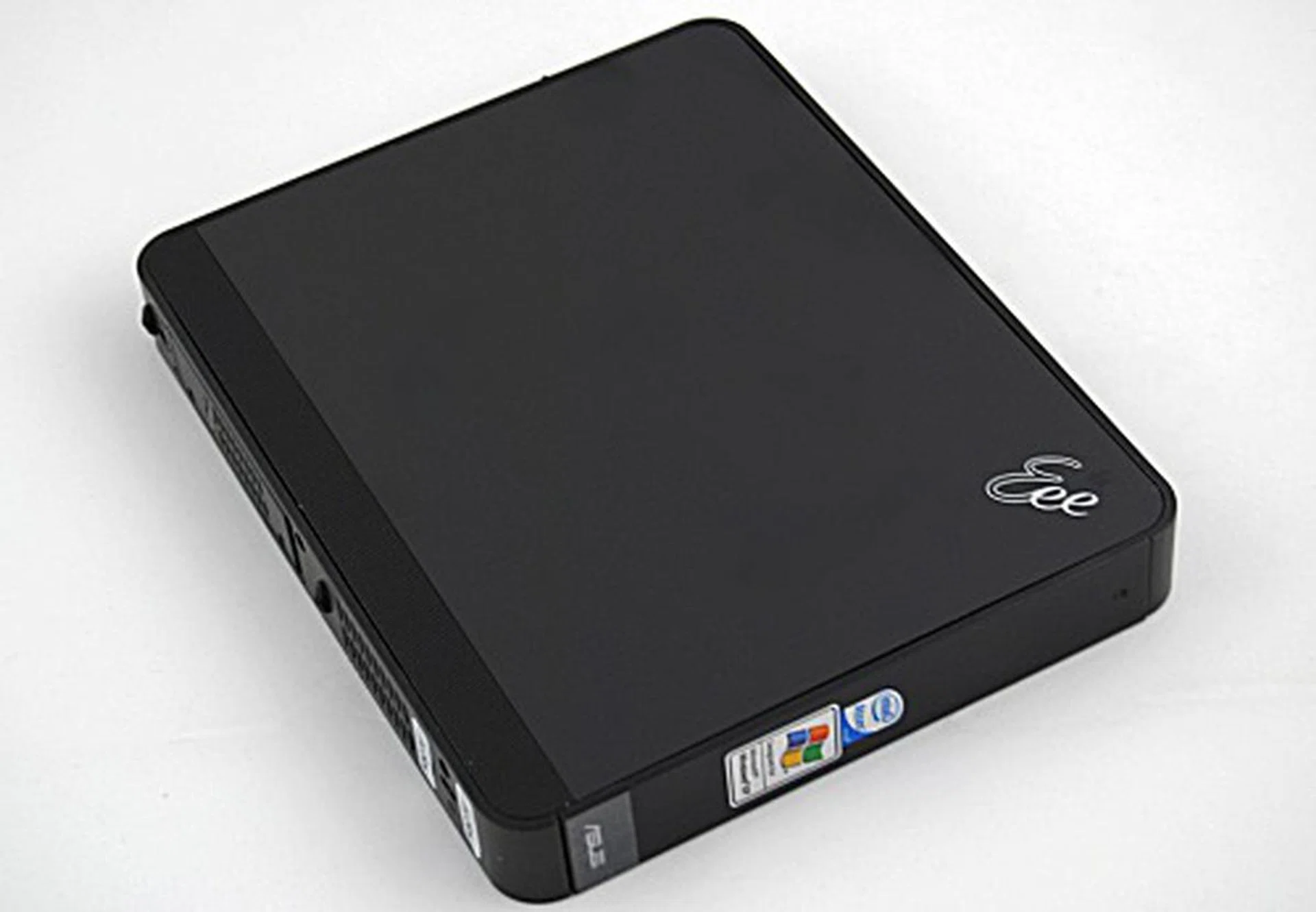 The base attachment is removable and you shouldn't really do without it as ASUS does warn you that you should never put the Eee Box this way when using it.