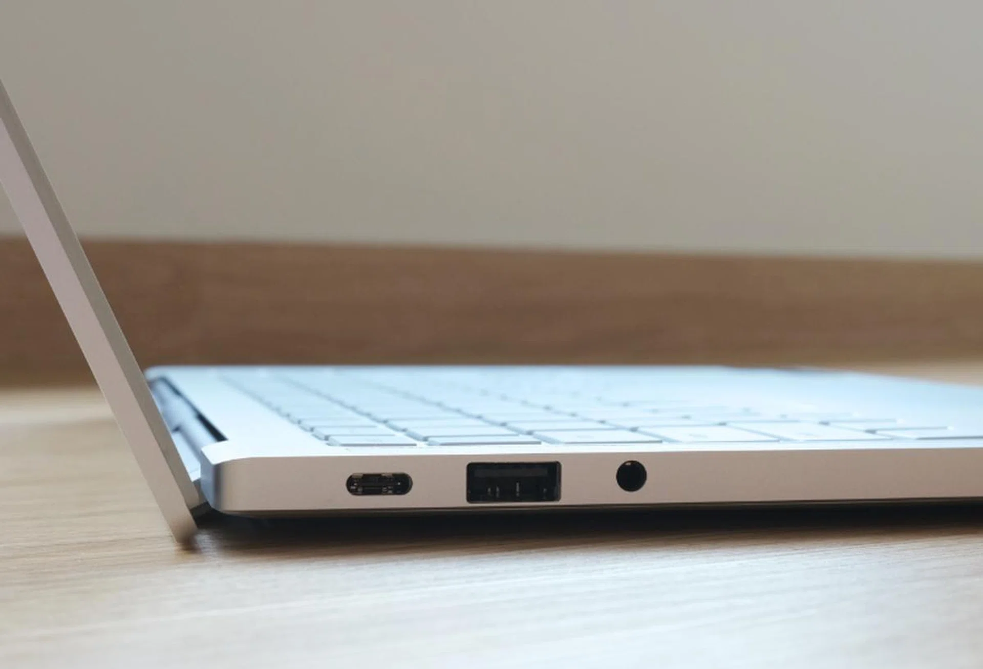 On the left is a USB-C Thunderbolt 4 port, a USB-A port, and a 3.5mm audio jack.