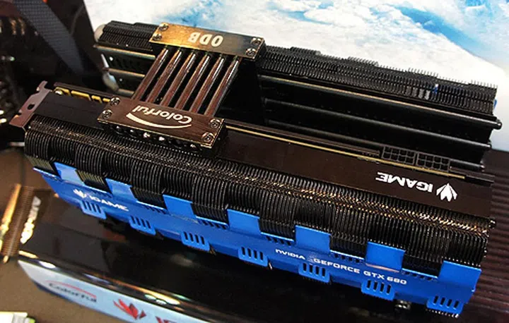 No fans, but the card wields two simply colossal heatsinks. Also, the case needs to be decently ventilated for this cooling setup to work.