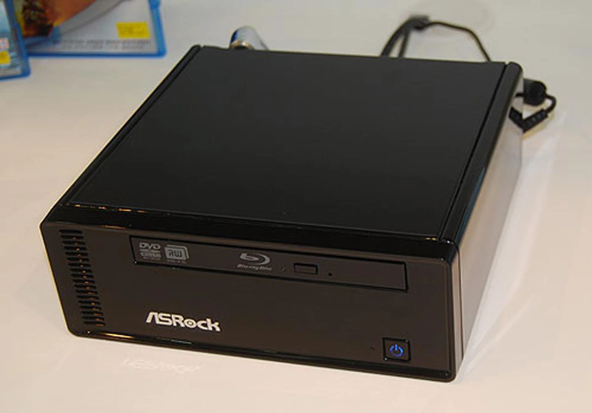 This is the Ion nettop that we saw, with a dual-core Intel Atom on the Ion platform along with a Sony Blu-ray drive and a 320GB hard drive. The demo by ASRock had it running a HD 1080p video in Windows 7.