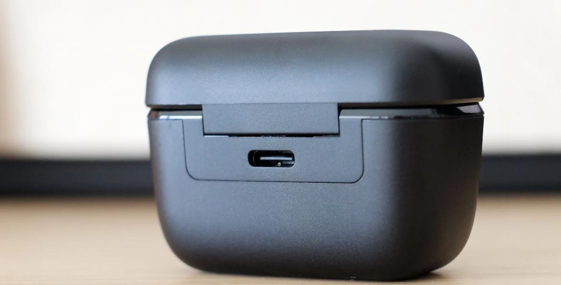 No wireless charging, you'll have to power the charging case via USB-C.