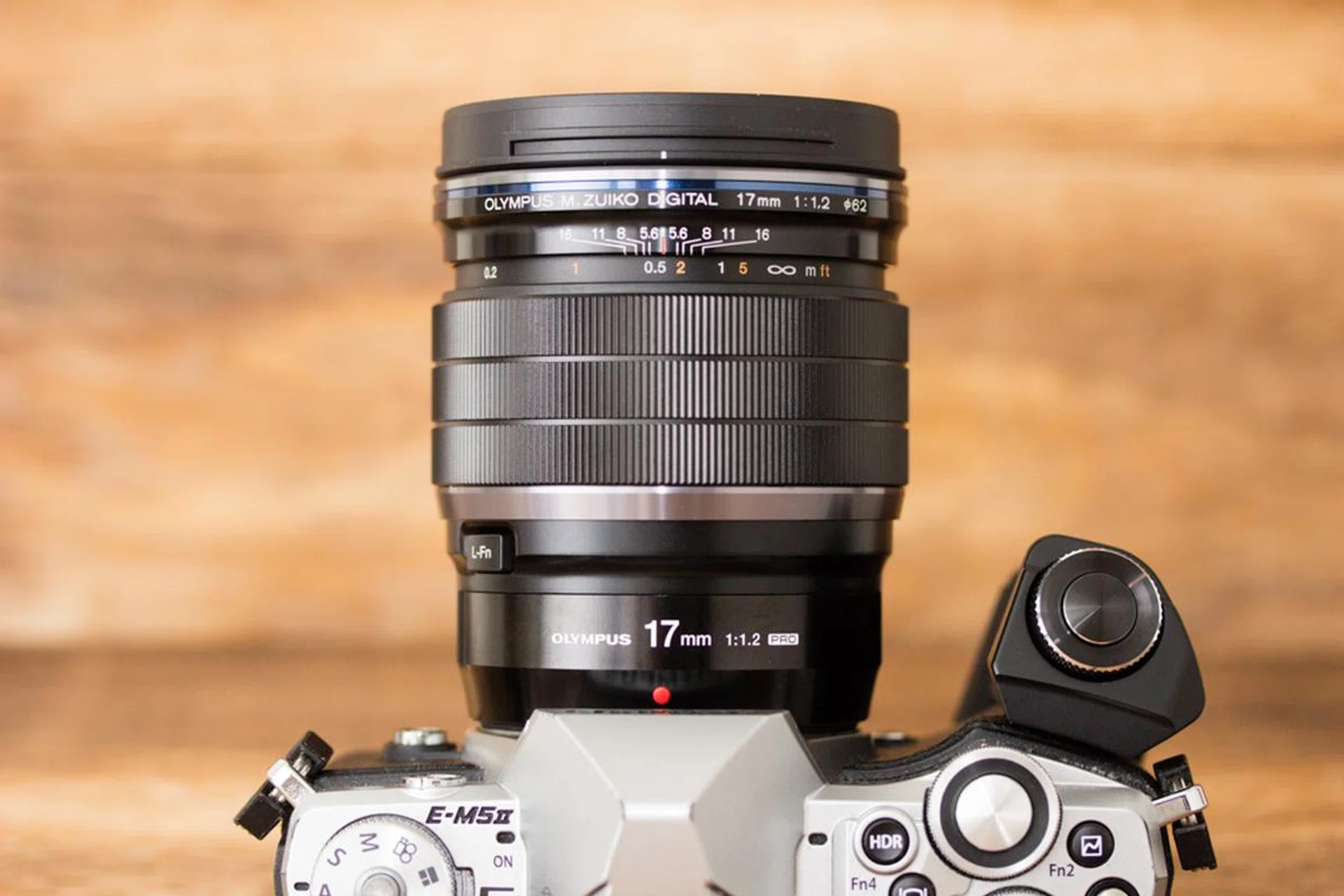 Pull down the manual focus clutch to immediately engage manual focus.