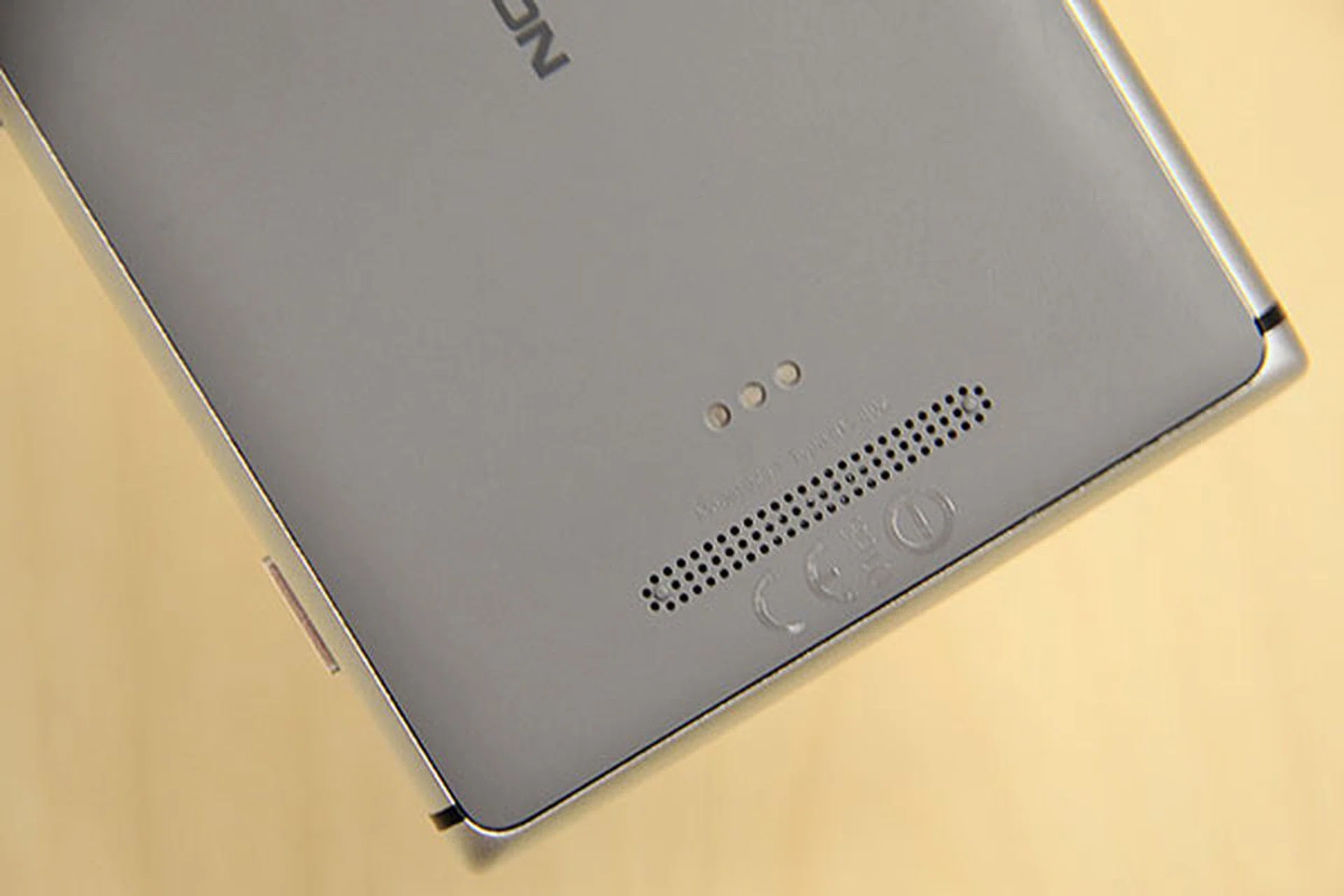 One reason why the Lumia 925 is thinner than the 920 is because it doesn't have the Qi wireless charging built-in. You can always buy a wireless charging shell; hence the pogo pins at the back of the phone.