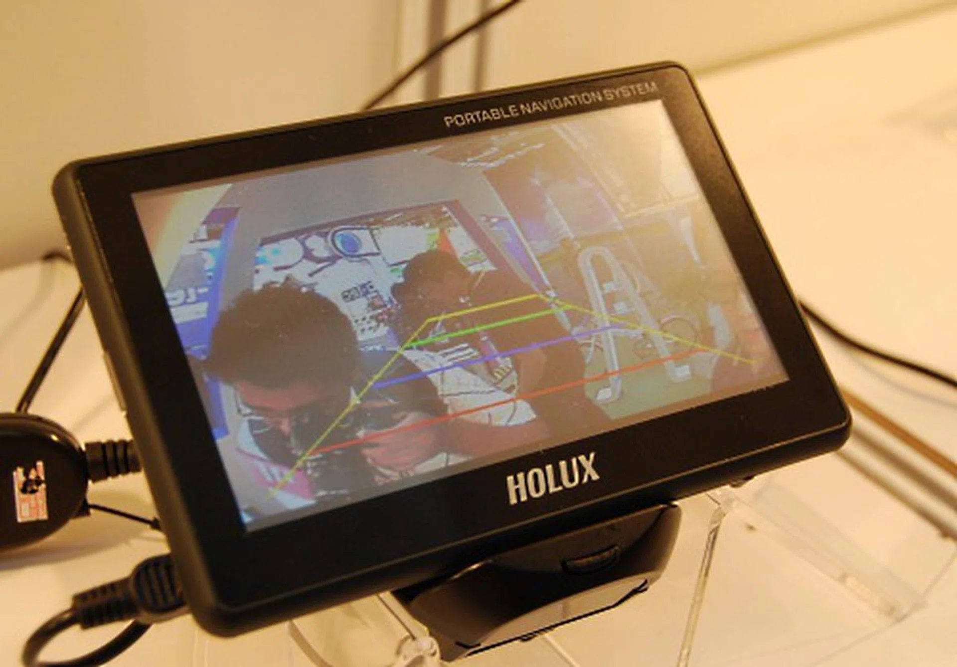 Holux does car navigation systems and the GPSmile 62AS is a fine example. This 5-inch device comes with a TFT LCD with touch screen and has a vehicle rearview camera