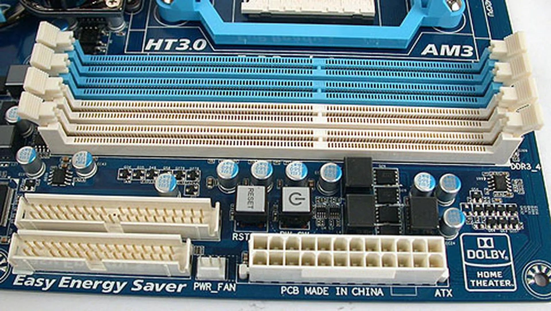 It looks rather cramped here, as the ATX power, floppy and IDE connectors all converge. It also happens to where the power and reset buttons are found. Not exactly ideal.
