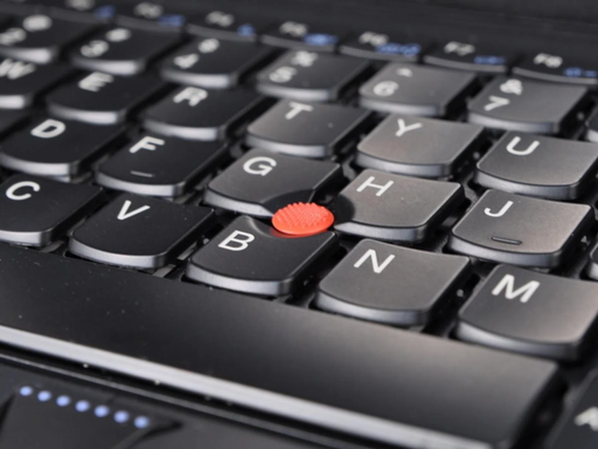 The spill-resistant, back-lit keys are slightly curved for improved comfort in typing. Good for users who like to type and 'slide'.