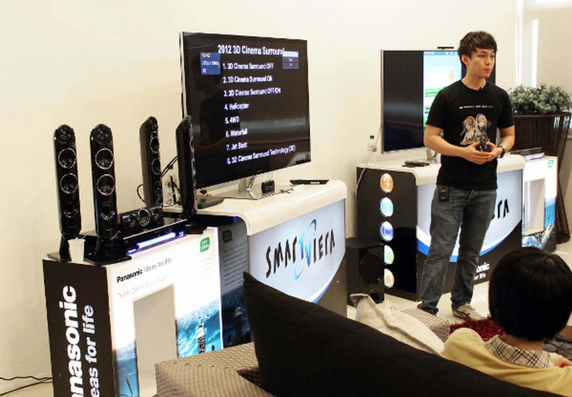 Following that, it was Panasonic's turn to showcase their home audio systems. Our attendees had the pleasure to experience the surround sound of the Panasonic SC-BTT430, which is seen on the left side of this photo. On the screen, you can glimpse some of the demos that John Tan from Panasonic Singapore had lined up to showcase the audio system's capabilities.