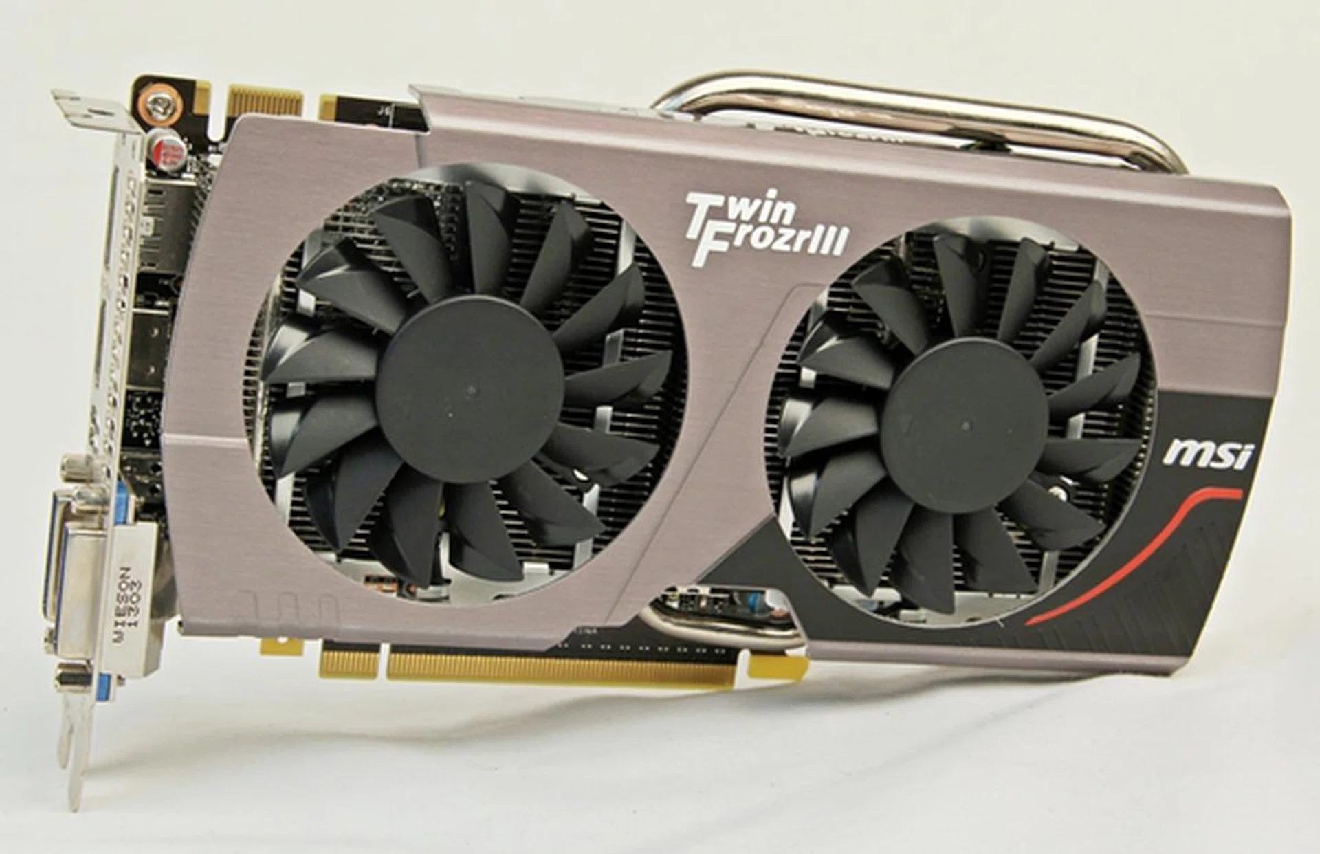 The MSI GTX 650 Ti Boost Twin Frozr III OC sports an overclocked GK104 GPU operating at a base clock of 1033MHz that is slightly higher than similar cards. Coupled with its Gaming series brand, MSI is clearly attempting to distinguish the card amid the noise faced by such mid-range ones. Sadly, it doesn't look any different as we expected a pro-gamer centric cooler styling.