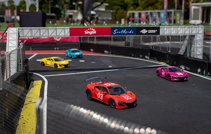 Formula Square remote-controlled car race using Singtel's 5G connection.