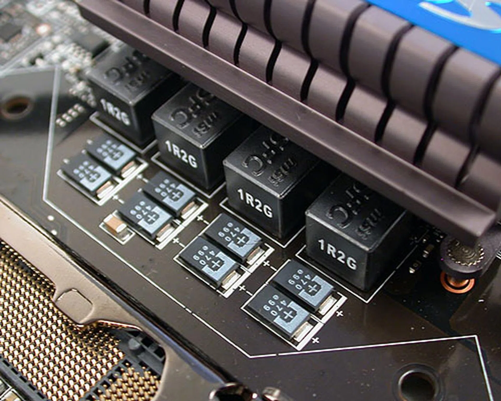 MSI claims that the Trinergy is the first motherboard to use these hi-c cap or highly-conductive polymerized capacitors. We'll admit that while we have seen such capacitors on other boards, it's the first time we're seeing it completely dotting the whole board. Next, the ferrite chokes used here are claimed to be 20% more power efficient than the normal ones while its extremely low impedance helps to keep temperatures low.