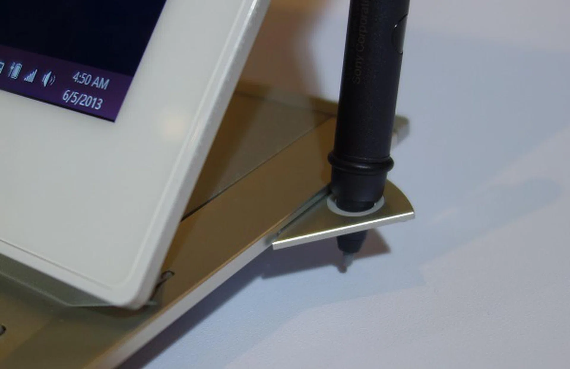 Otherwise, when in use, the stylus can sit in a hidden holder, which conveniently swivels out from the side of the Duo 13.