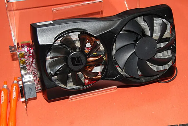 The PowerColor Radeon HD 6970 X2 was unveiled at Computex 2011.  Notice the different cooler fan sizes? PowerColor claims that the differences help to drive the air towards the rear of the chassis, leading to improved airflow. It remains to be seen if PowerColor will launch their Radeon HD 7970 X2 at this year's Computex.