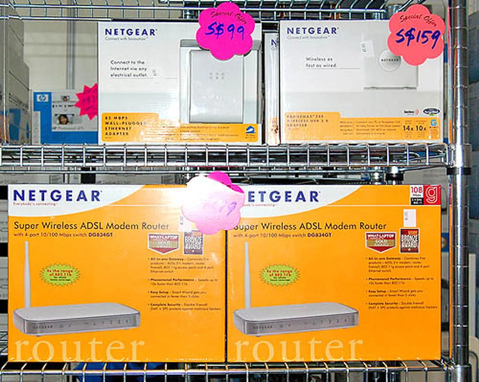  Well this image of Netgear's Super Wireless ADSL Modem Routers and Ethernet adapters more or less speaks for itself. Grab these NETGEAR products fresh from the IT Show 2007.  
