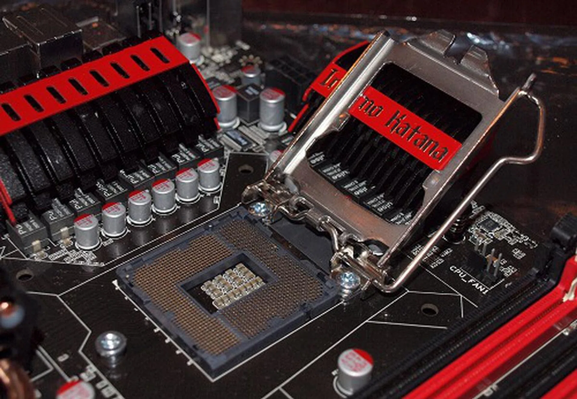  Here's a sample shot of an Intel P55 motherboard that we had a chance to play with recently at the show. Notice how the entire socket is smaller than the LGA 1366? The socket base and locking mechanism/securing plate are also different and use less material too - all in the bid to optimize cost and pass on the savings to end-users.  