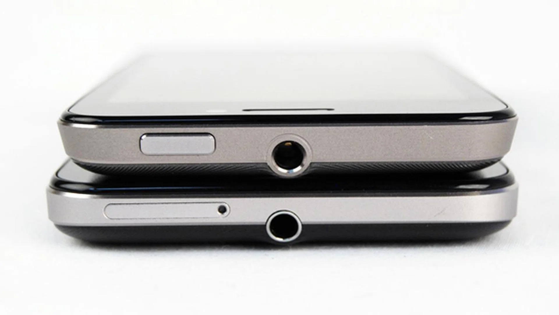 A micro-SIM card slot replaces the Power button in the ASUS PadFone 2 (bottom).