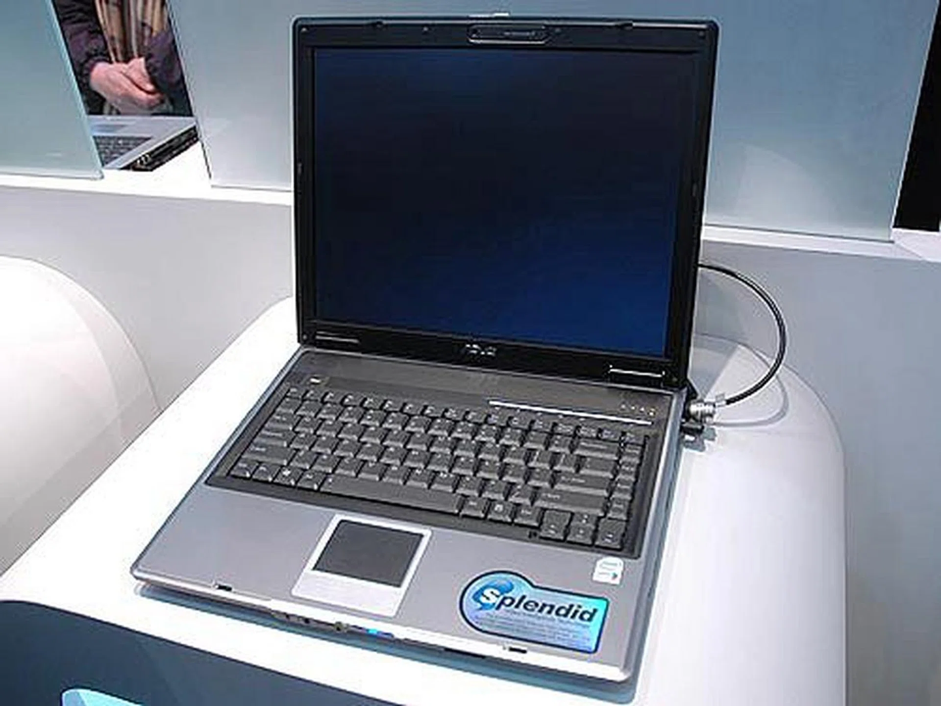 The ASUS F2J is a business notebook featuring the latest Intel 945PM chipset with an Intel Core Duo processor. It comes with an ATI Mobility Radeon X1400 graphics and security features like TPM 1.2 and biometric fingerprinting. It also features a liquid spill proof keyboard and an exclusive ASUS hard disk drive protect design which keeps the hard disk safe from rough handling.