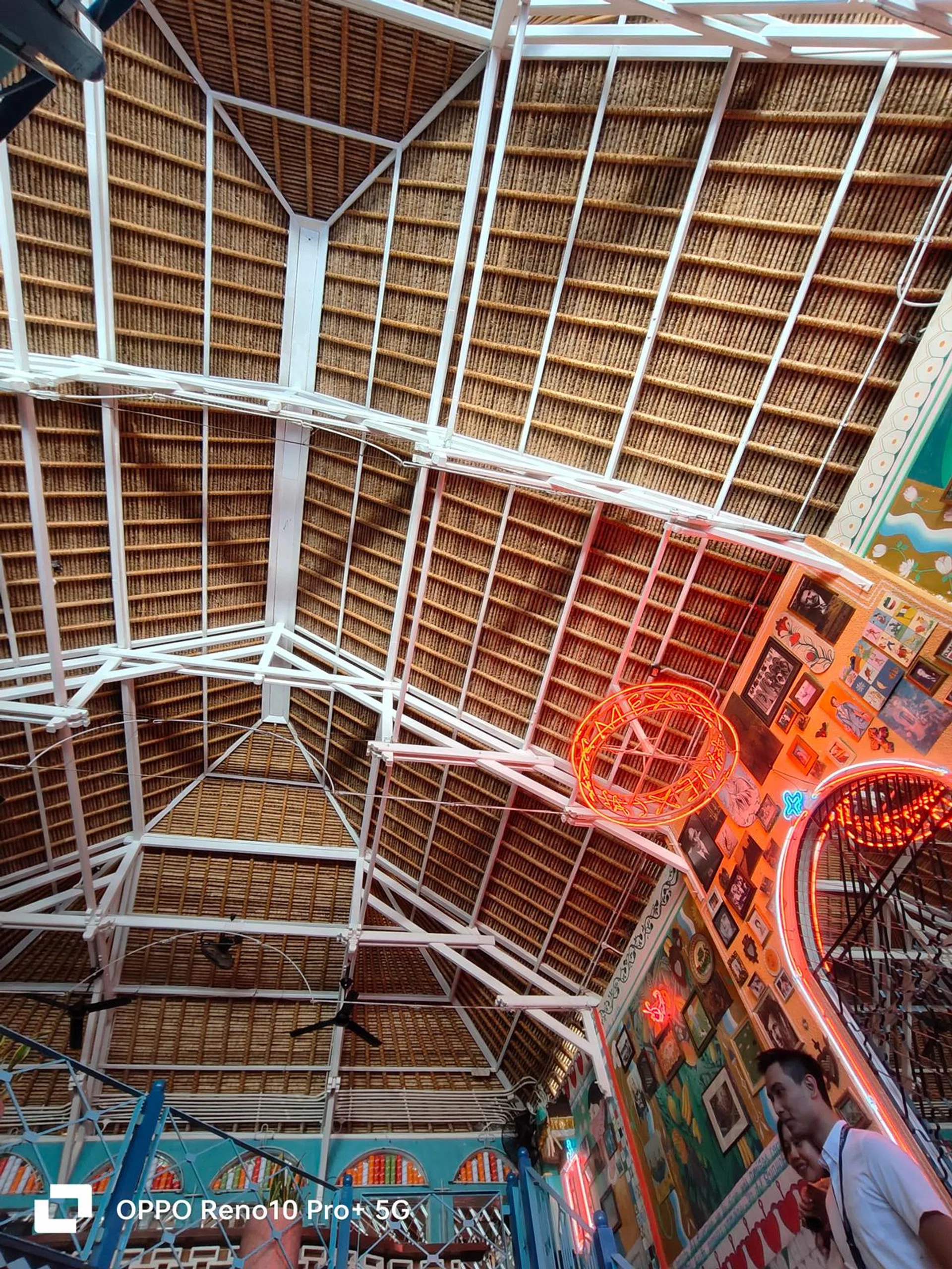 Ultra-wide angle camera. See the visible fish eye distortion in the bottom-right corner.