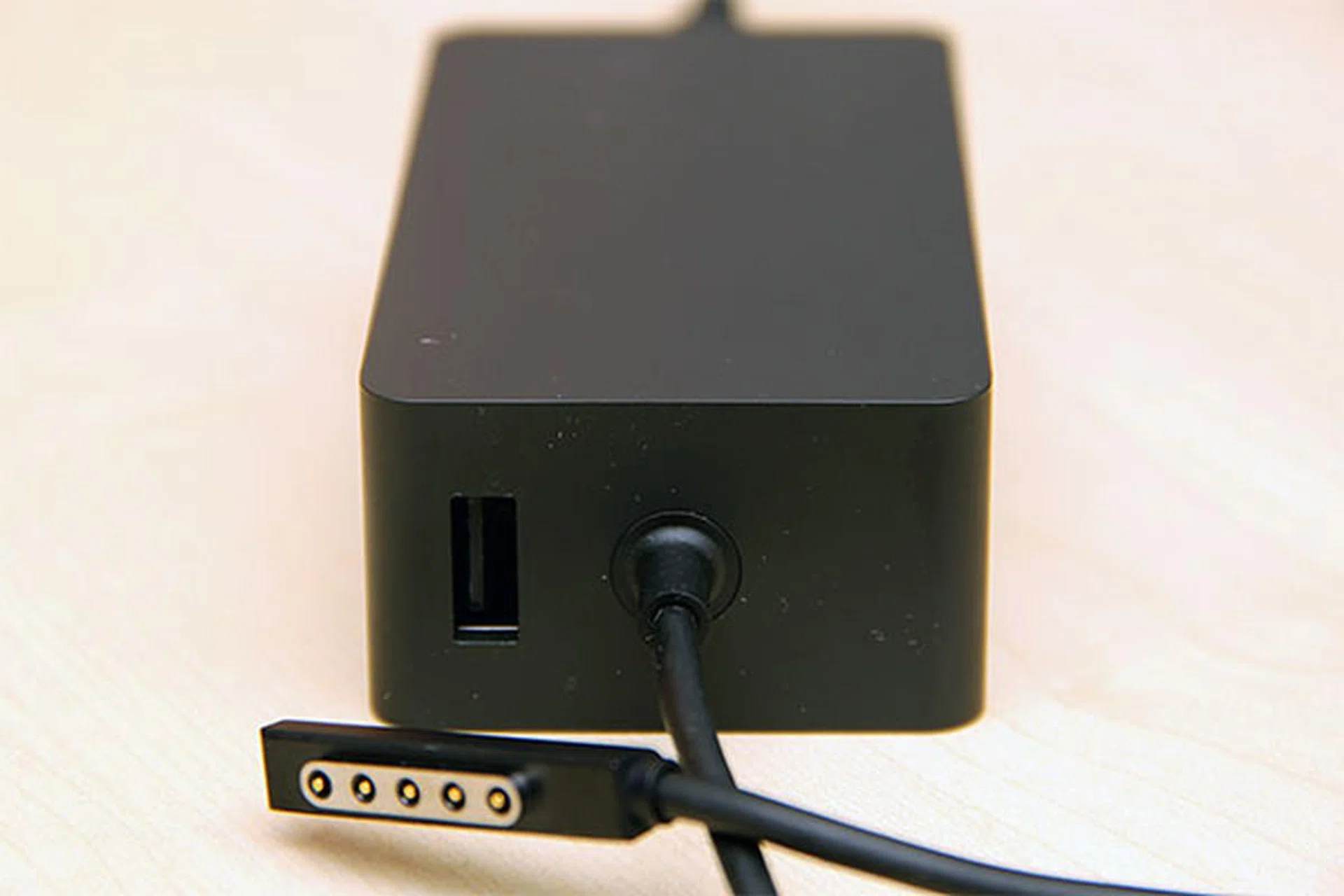 Unlike the Surface RT that comes with a wall wart-type AC adapter, the Surface Pro requires a power brick (12V, 3.6A). On the brick itself there's a 5W USB port (5V, 1A) for charging your USB devices.
