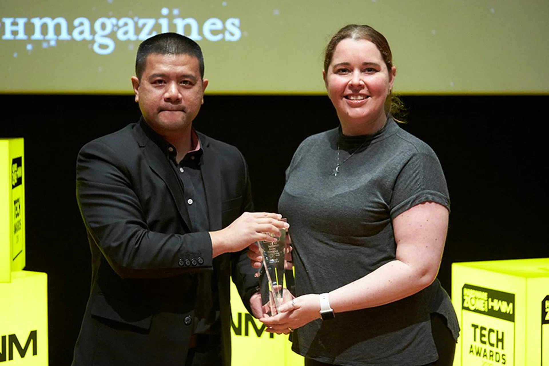 The Editor's Choice for Best Game Console goes to Microsoft's Xbox One X. Accepting the award here is Ms. Sarah Creelman, Regional Communications Lead, Xbox Asia, Microsoft.