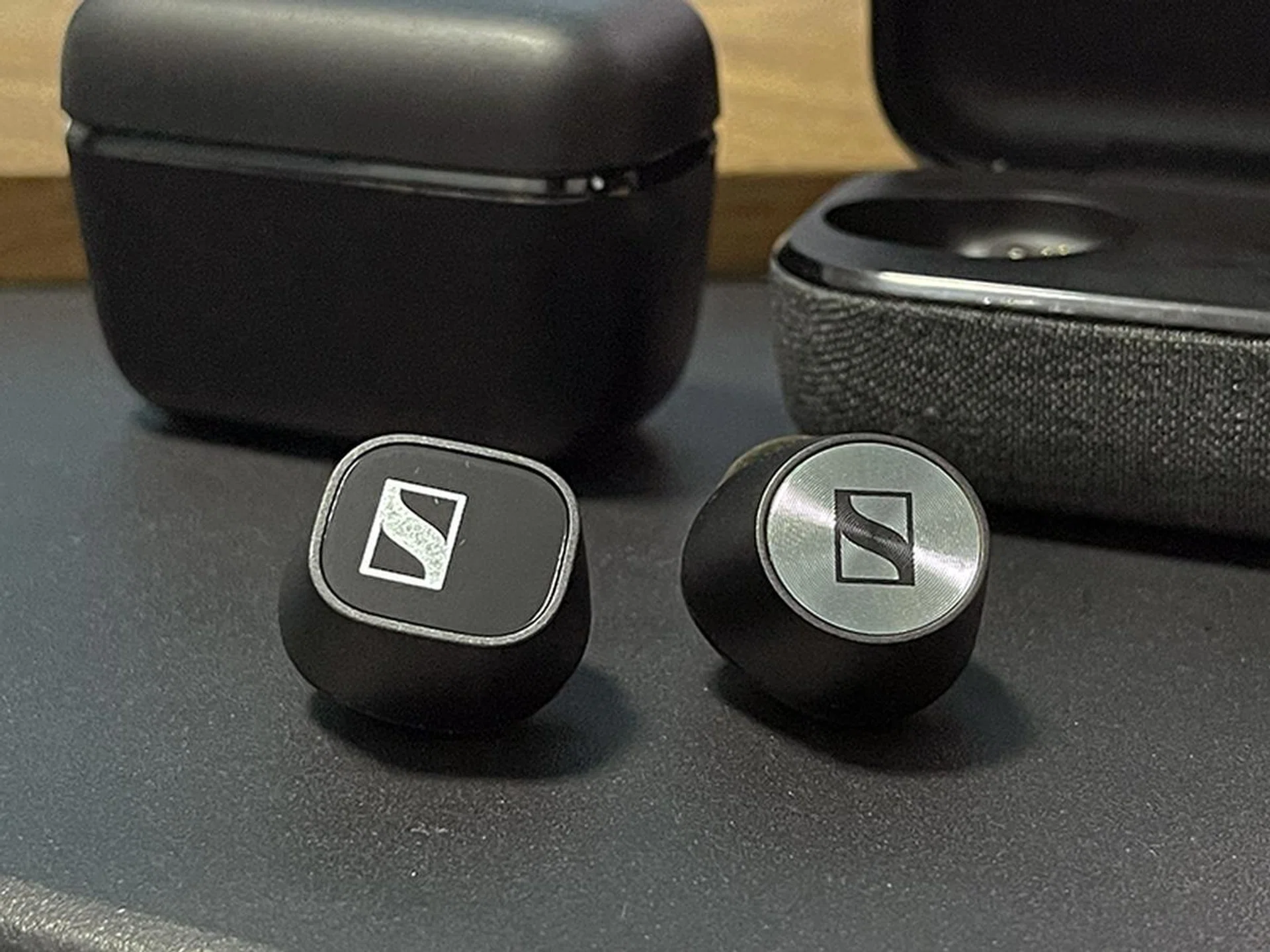 Both earbuds look almost exactly the same except for the cap, but the CX 400BT feels lighter in the ear than the MTW2.