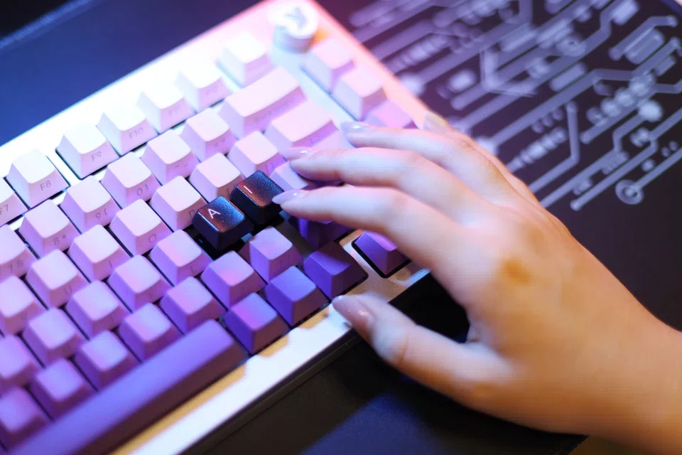 Image of hand typing on keyboard to symbolize technology
