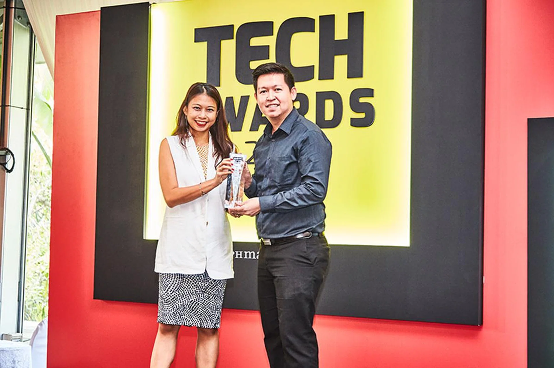 ASUS is the biggest winner this year with 8 awards: Editor's Choice for Best Motherboard, Best Gaming Graphics Card, Best Gaming Monitor, and Readers' Choice for Best 2-in-1 Notebook Brand, Best Gaming Monitor Brand, Best Graphics Card Brand, Best Motherboard Brand, and Best Wireless Networking Brand. Accepting the awards is Mr. Desmond Soh, Business Development Manager for ASUS.