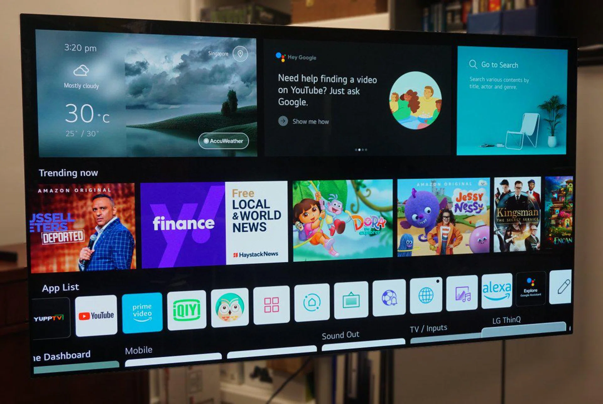 Here's a close-up of the first fold of the webOS home screen. Besides the help and info panels on the top half, the bottom half has very useful set of lists, the first being all the trending shows from all (streaming) channels. Next comes the quick list of apps you can jump into, which is customisable. Even this layout seen can be customised to your preference.