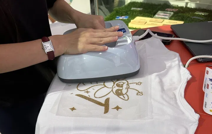 You can print your own design on a T-shirt.