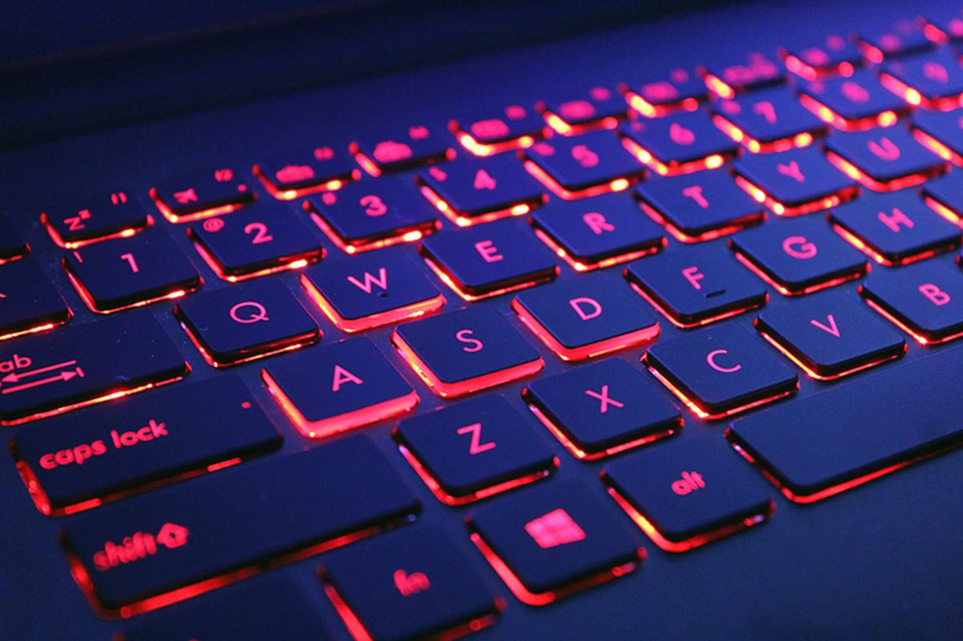 The "WASD" keys are specially highlighted with bolder red accents. The red back lights are sadly non-customizable.