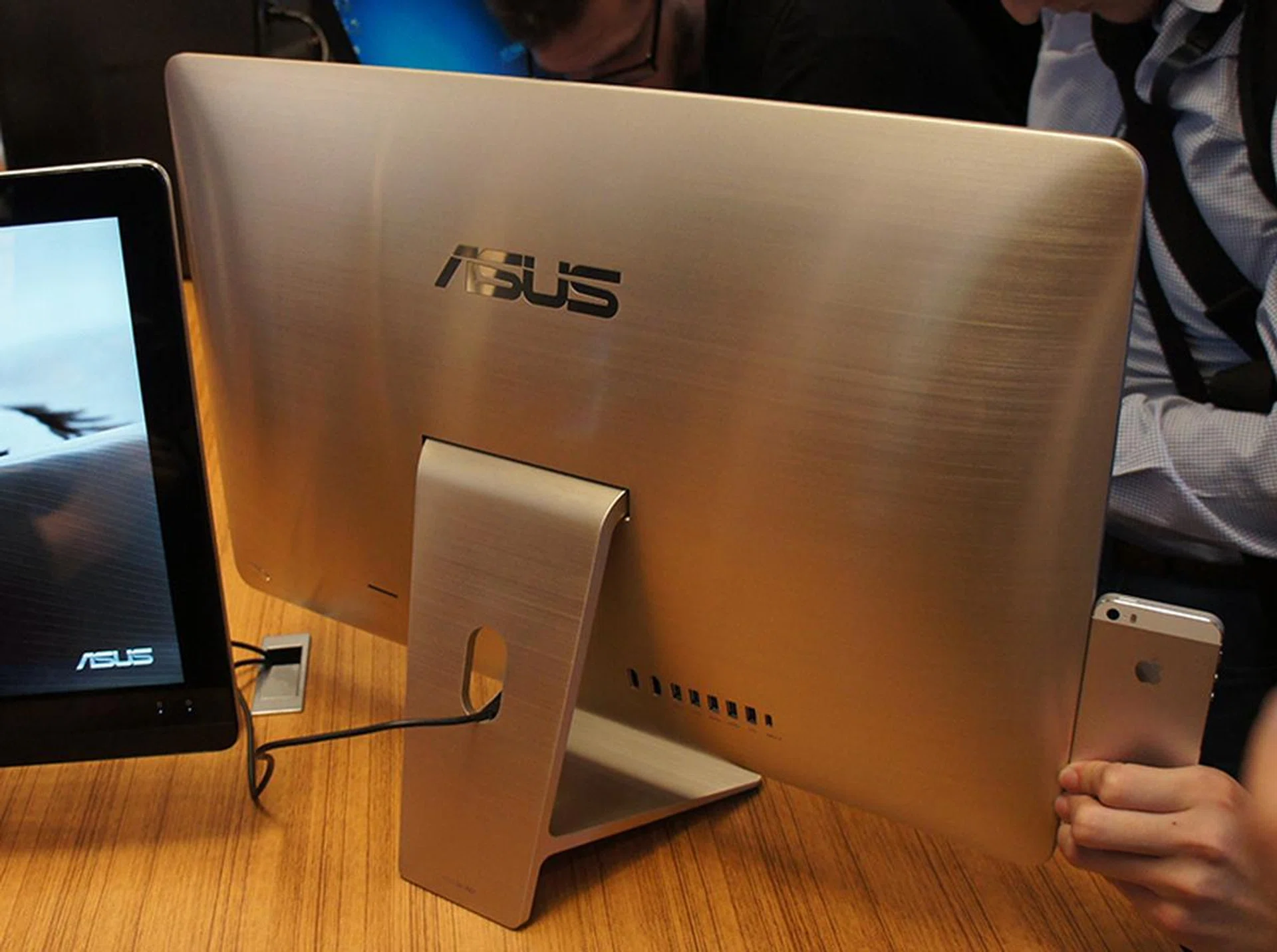 The unit on display was in gold (note the matching gold iPhone in the bottom right corner). Behind, there's an Ethernet jack, USB 3.0 and 2.0 ports and a single USB Type-C port.