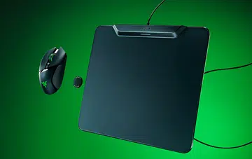 The HyperFlux V2 works a little differently than its predecessor (note the small charging puck). Image: Razer.