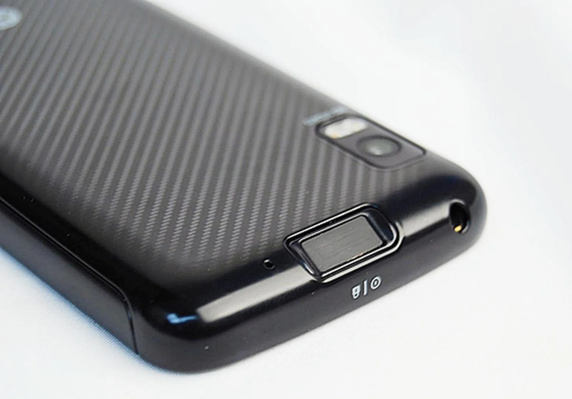 Noticed the slight slope? The power button is positioned at an awkward angle, and is not something we are fond of or used to.  The 3.5mm audio port sits flushed to the right.