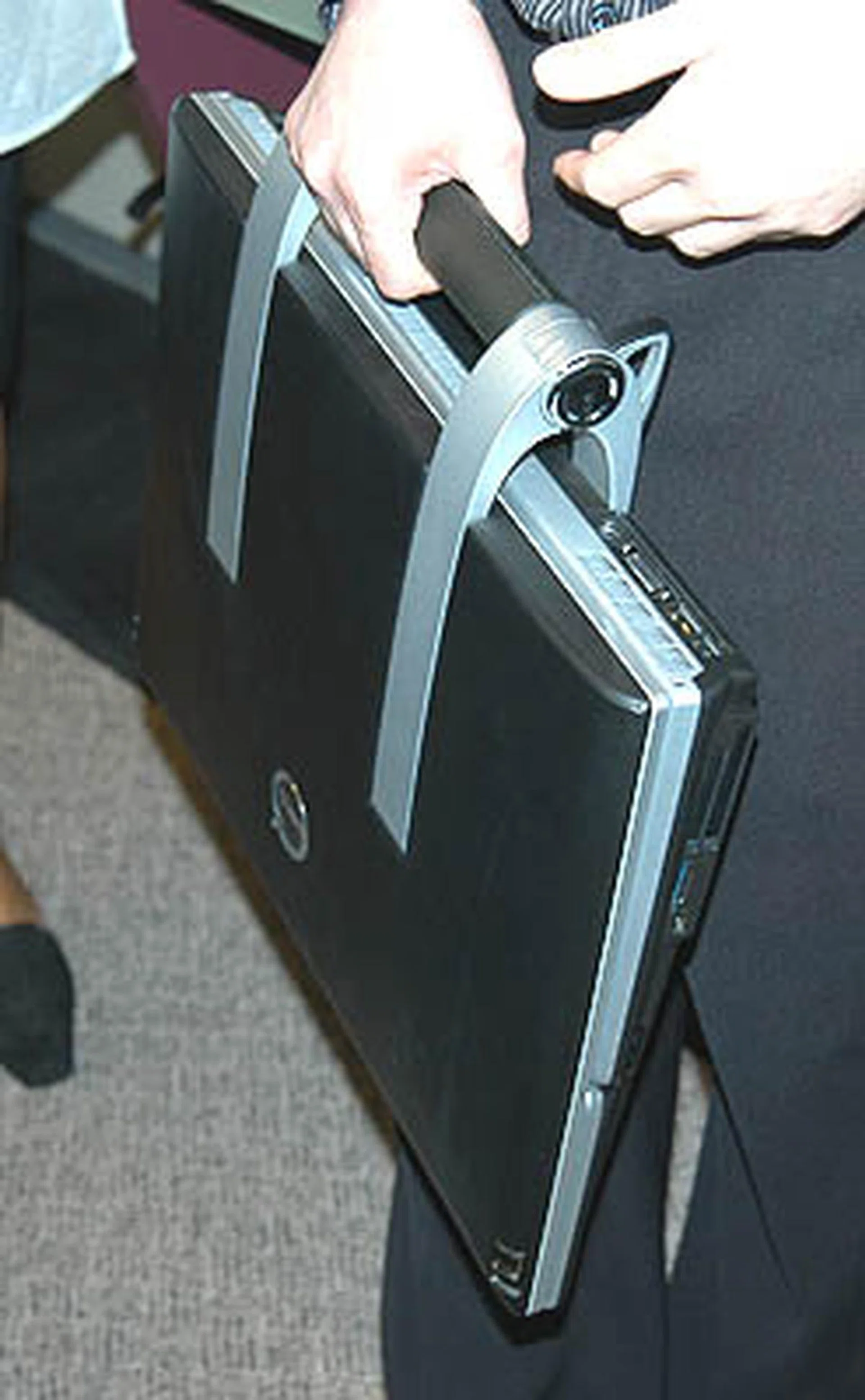 The XPS M2010's design integrates a handle for you to transport this 8.3Kg 'notebook' around when needed.