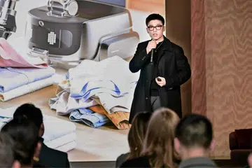 Dreame is pitching a completely automated laundry process, starting with a bionic arm that can sort and load clothes.