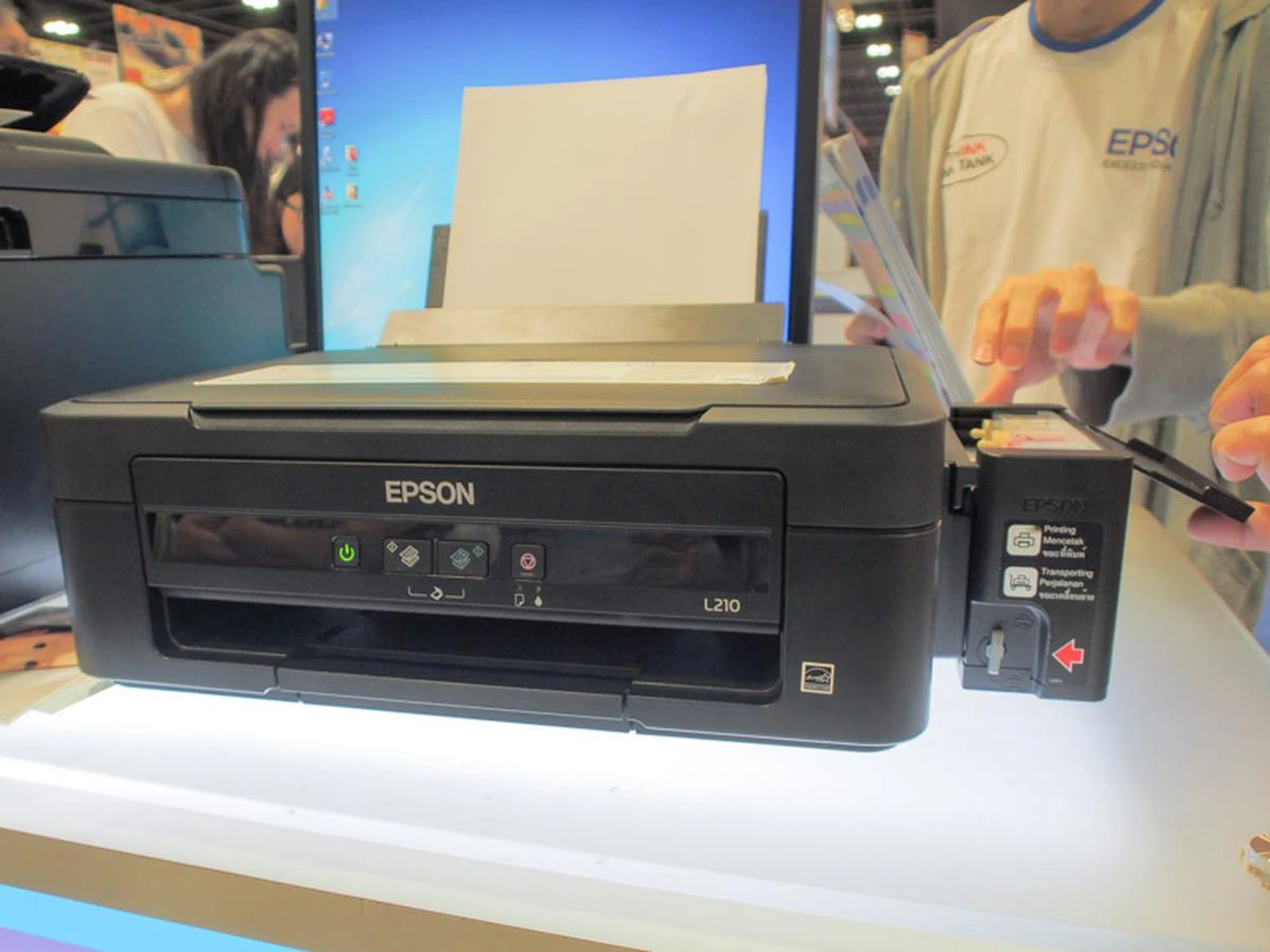 The Epson L210 is a all-in-one ink tank printer that does a print speed of 27/15ppm (mono/color), it does print, scan, and copy, and comes with a one year warranty (or 15,000 pages), $20 of CapitaMall vouchers, and a free trolley. This is going for a $199 (usual price $229).