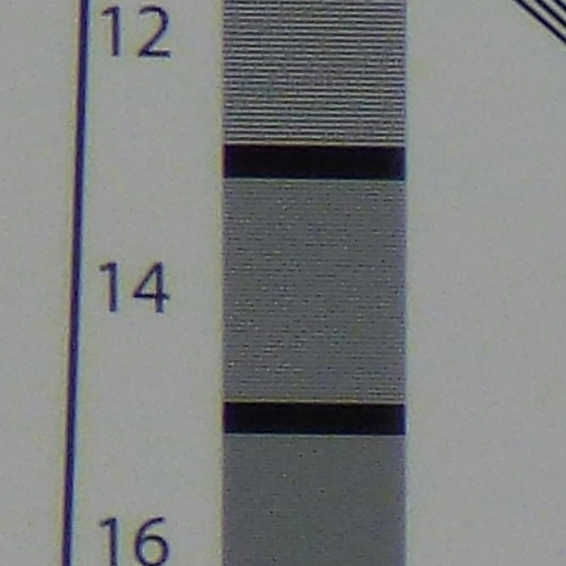 100% crop of our resolution test. Shot at the 21x with Intelligent Zoom (504mm). Resolution has decreased.